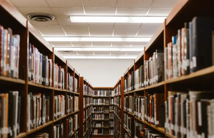 photo of a stacks of books in a library